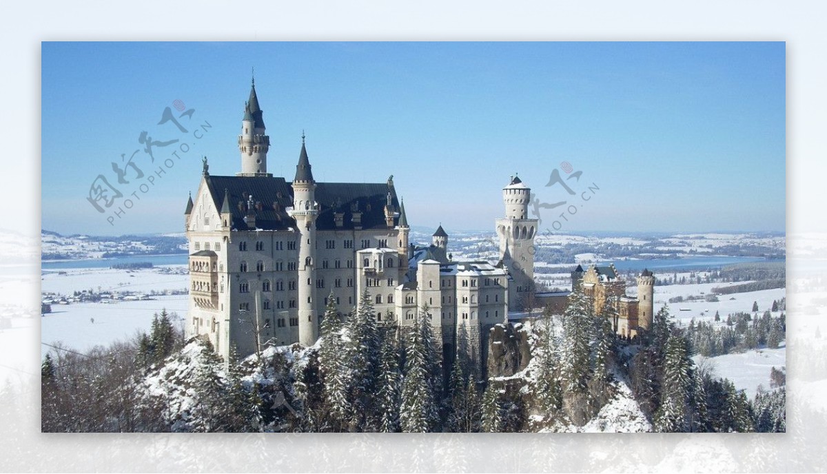 城堡雪景阳光图片