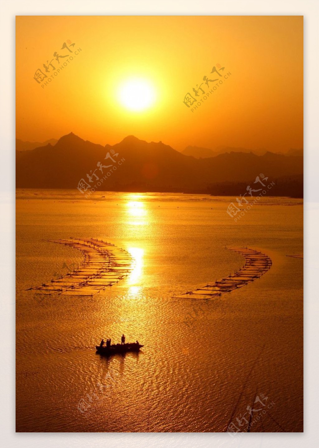太阳夕阳渔船图片