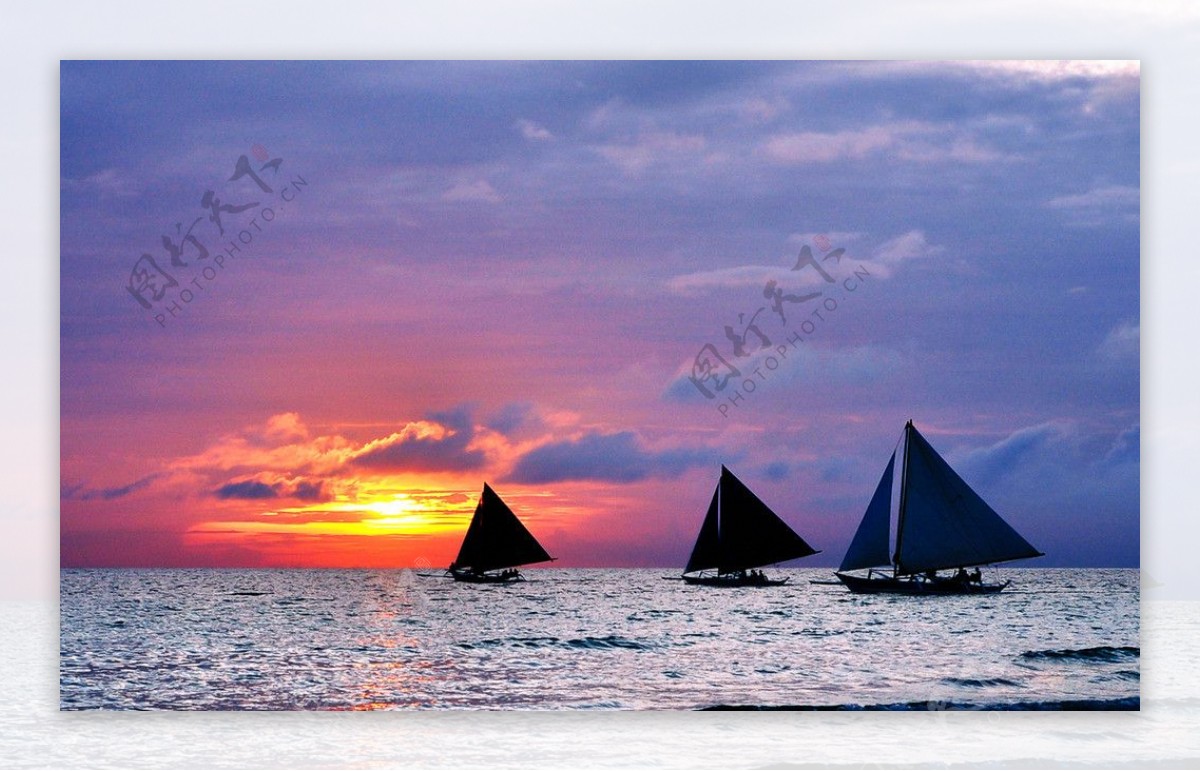 落日帆船图片