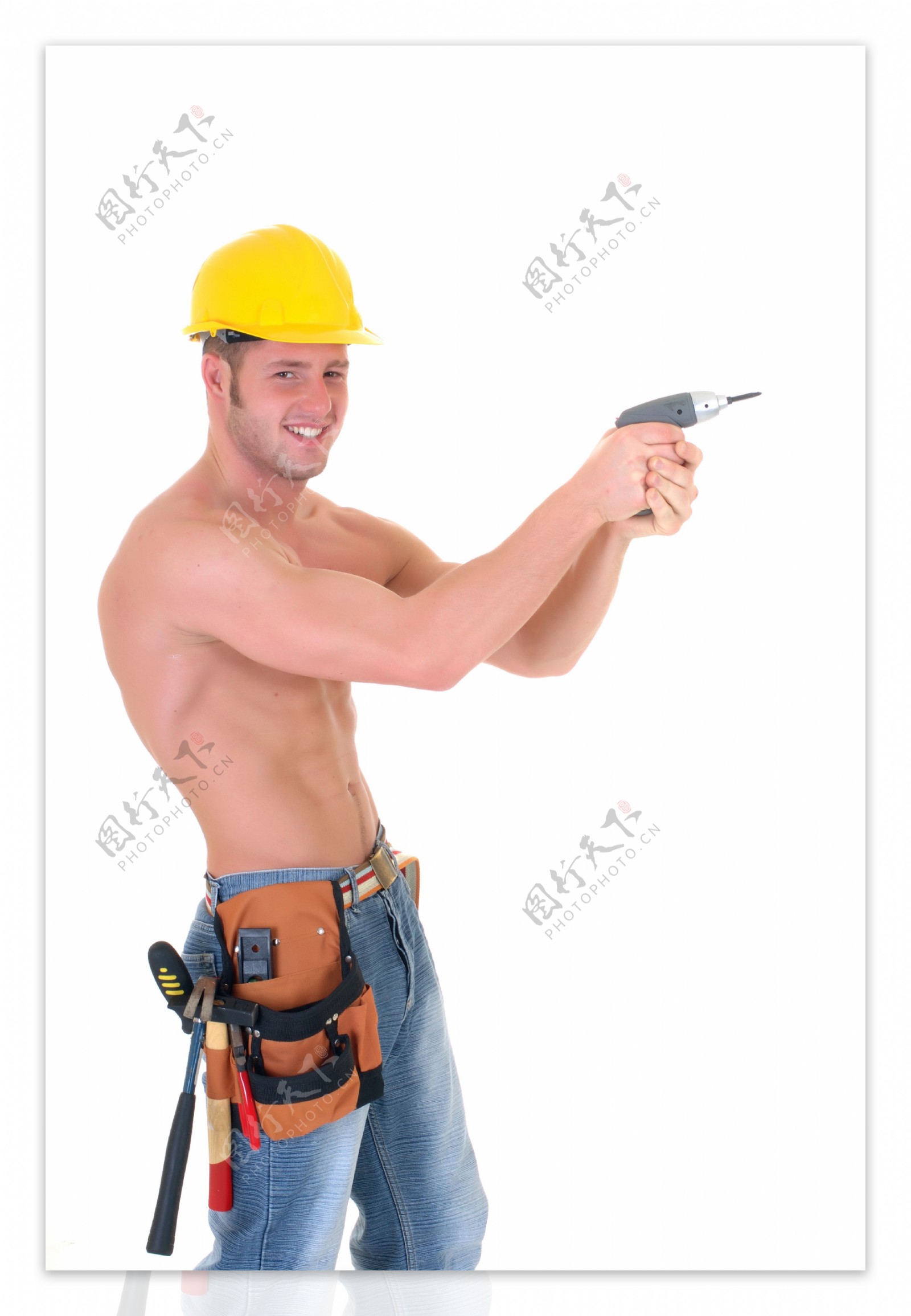 手拿电钻的建筑工人图片