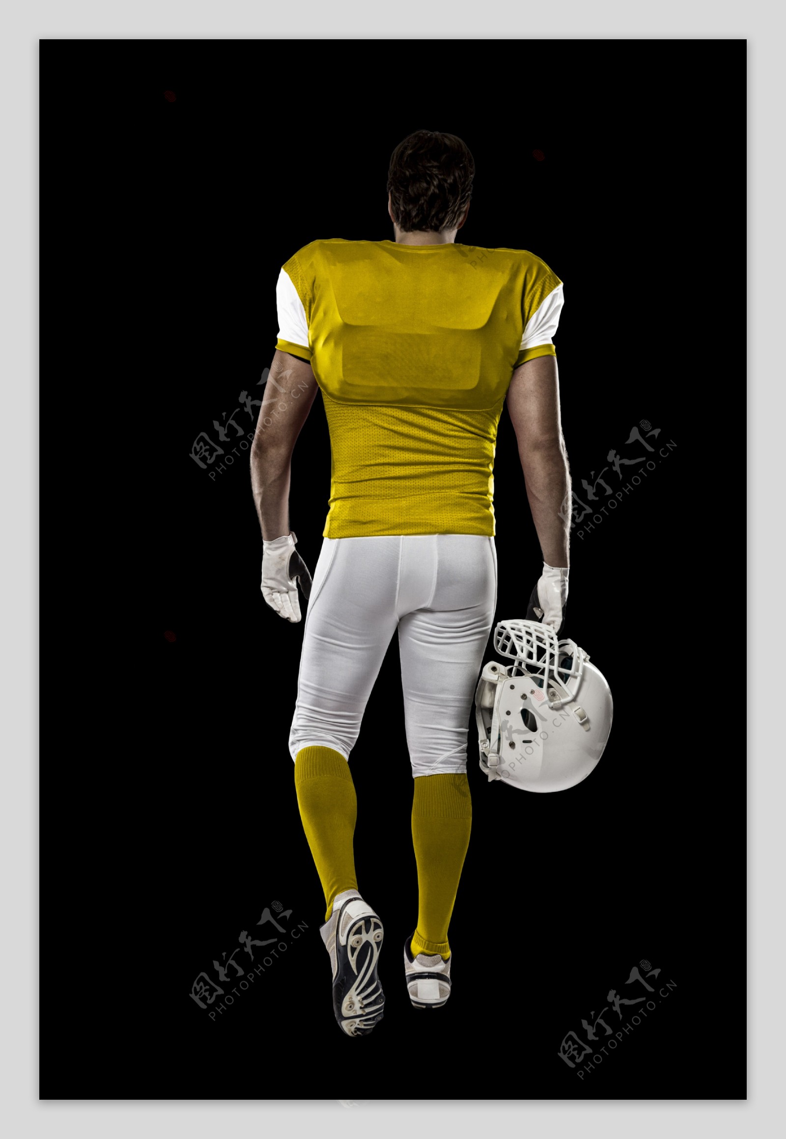 提着头盔的橄榄球运动员图片