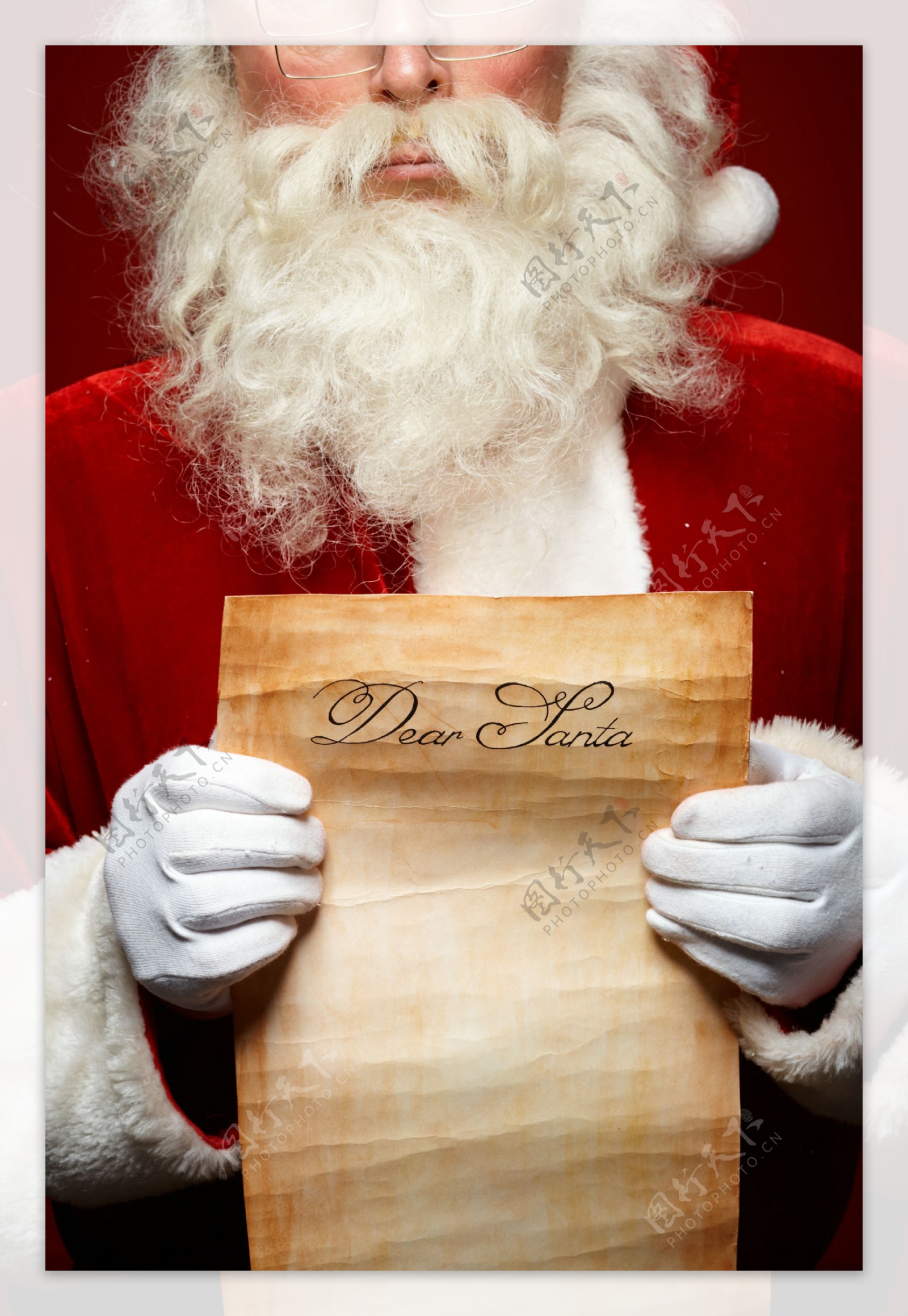拿着信纸的圣诞老人图片