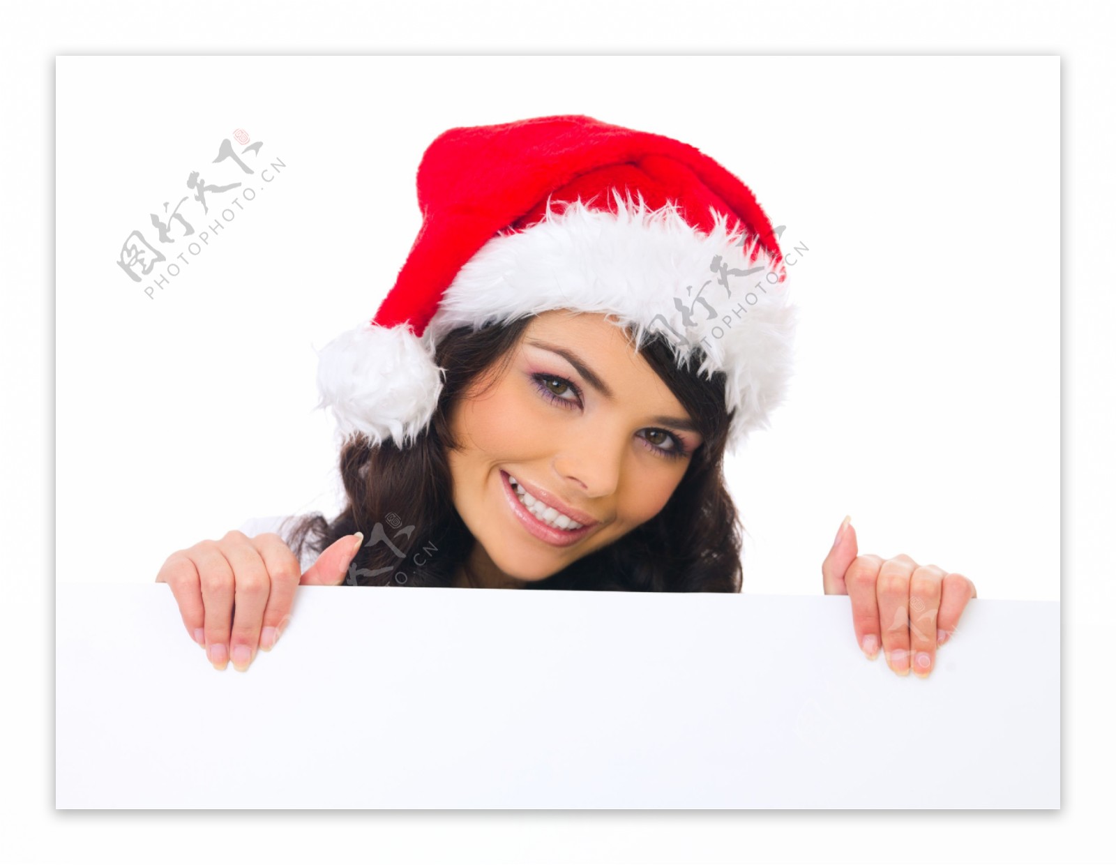 带着圣诞帽拿着广告牌的女人图片